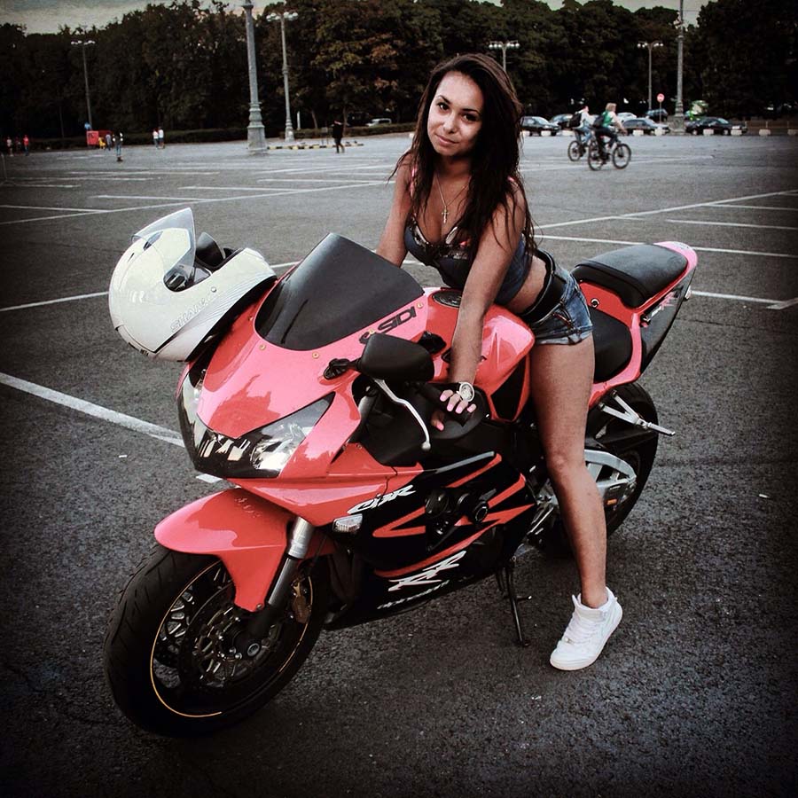 Brunettes on a motorcycle in Novosibirsk
