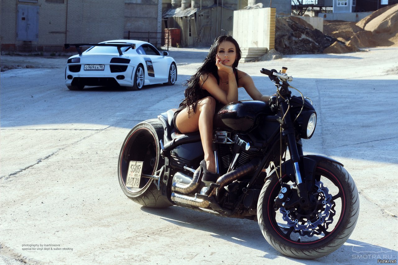 Sexy model Brunettes on a motorcycle in Novosibirsk